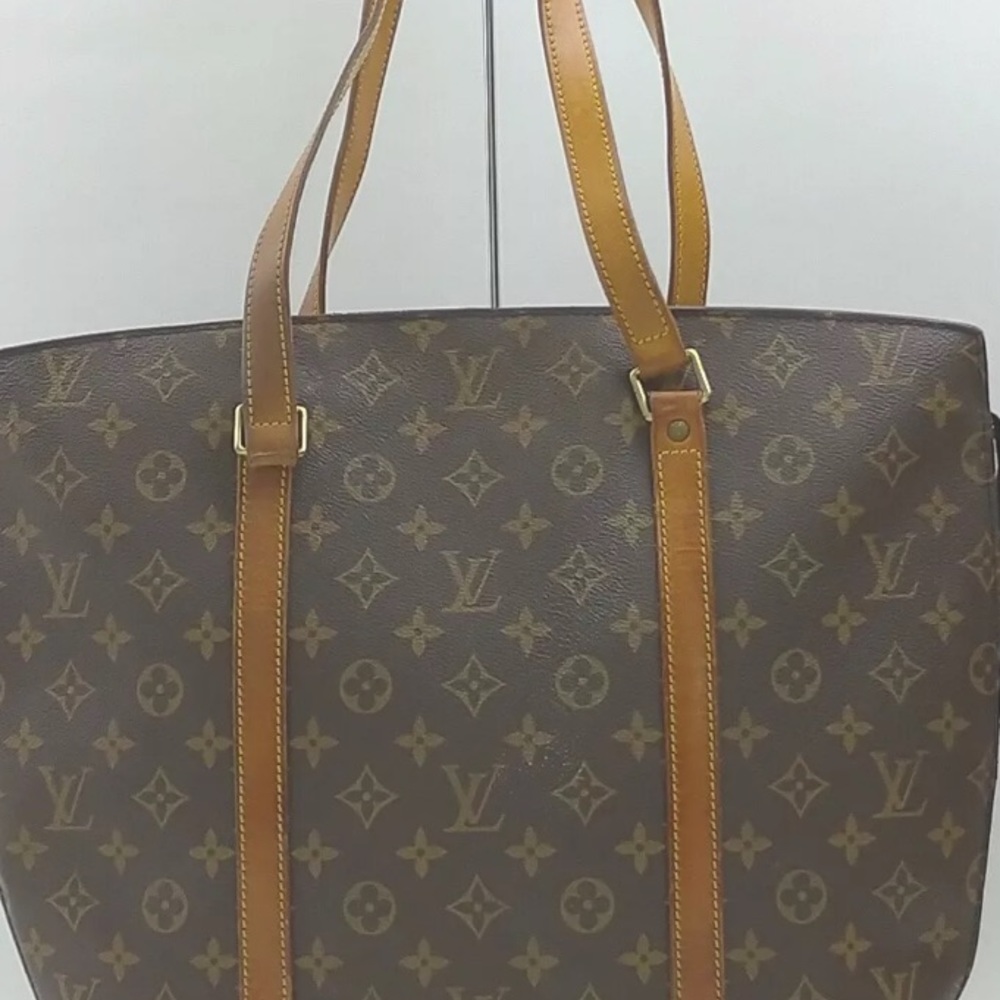 Authentic Louis Vuitton Babylone shoulder bag.
